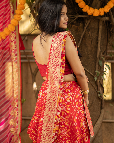 Classic Red Khaddi Georgette Bandhani Saree with Zari Border and Pallu
