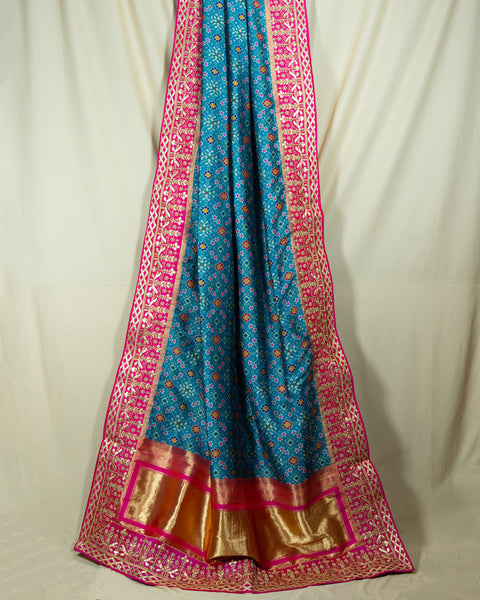 Elegant Sky Blue Patola Saree with Contrast Pink Border