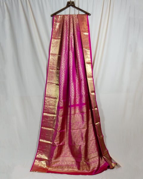 Pink Tissue Kanjeevaram Saree with Intricate Zari Work and Golden Zari Border