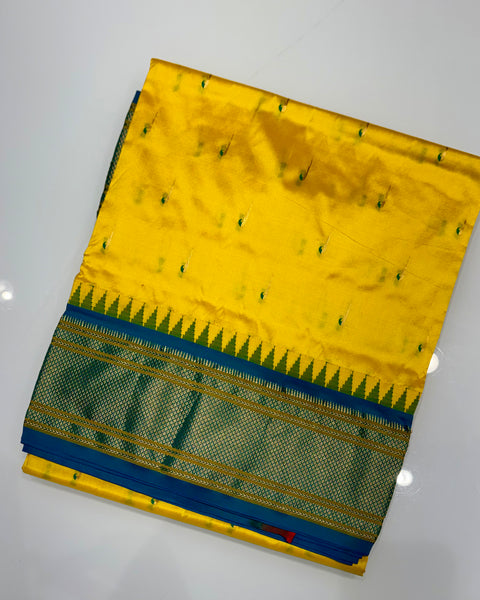 Butter Yellow Pure Silk Paithani with muniya butties