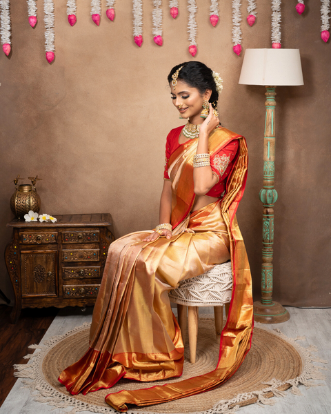 Beige Kanjeevaram Tissue Silk Saree with Zari Work and Red Border: Timeless Elegance