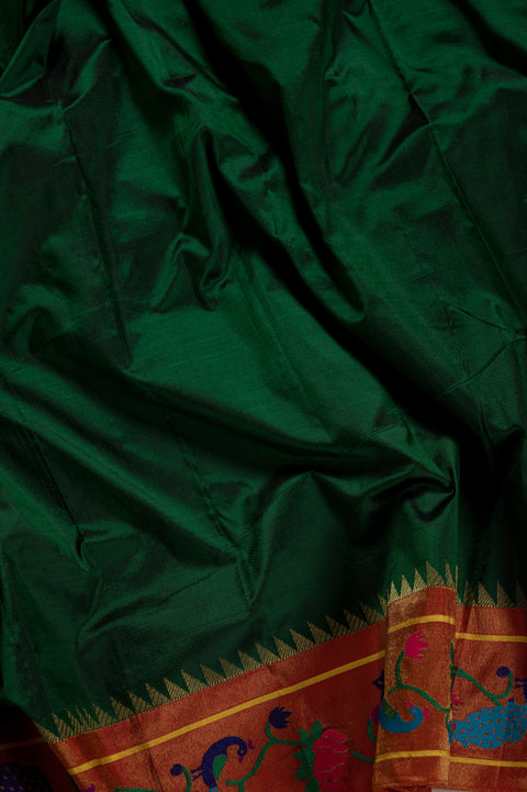 Bottle Green Handwoven Silk Saree with Lotus & Peacock Border