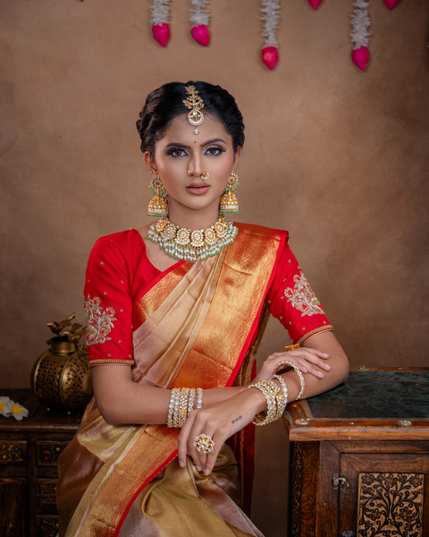 Beige Kanjeevaram Tissue Silk Saree with Zari Work and Red Border: Timeless Elegance