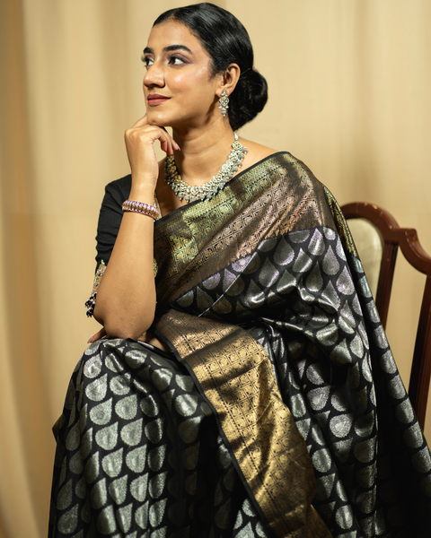 Black Kanjeevaram Silk Saree with Silk Zari Butties and Golden Border