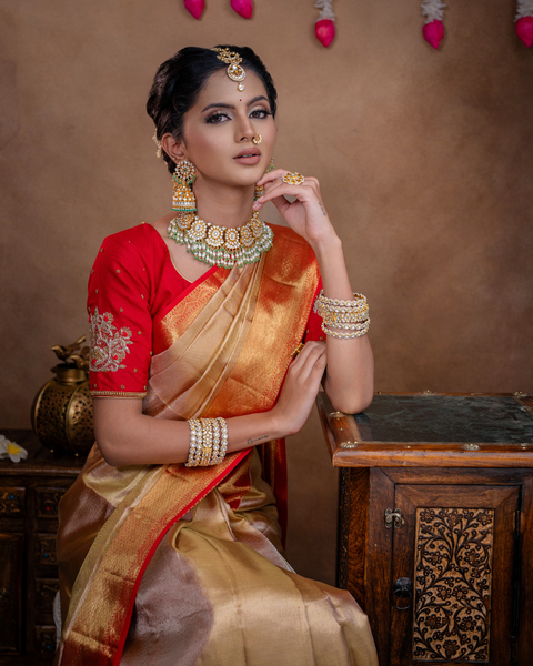 Beige Kanjeevaram Tissue Silk Saree with Zari Work and Red Border: Timeless Elegance