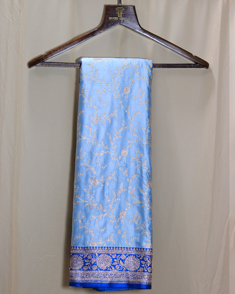 Sky Blue Banarasi Semi Silk Saree with Silver Zari Floral Jaal and Royal Blue Border