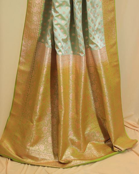 Mint Green Banarasi Semi-Silk Saree with Golden Zari Butti and Contrast Border