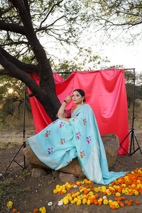 Firozi Pure Linen Saree with Floral Butties all over and Zari Border