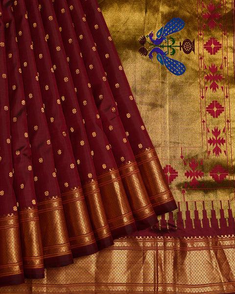 A maroon 9 yard pure silk Maharani Paithani with golden zari work Saree