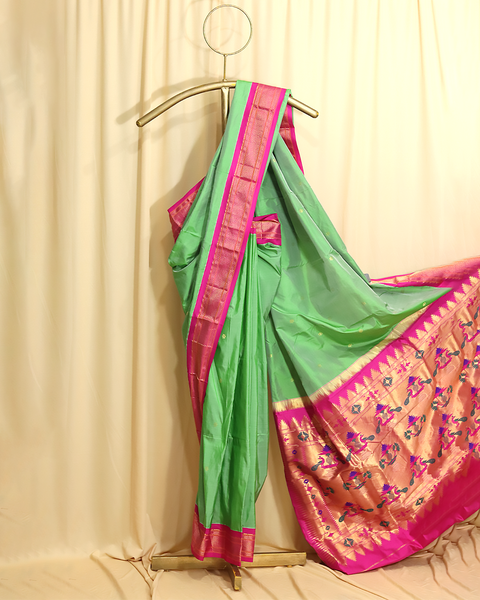 Pista Green Pure Silk Paithani Saree with Rani Pink Chatai Border