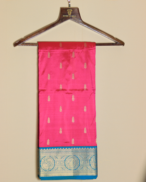 Rani Pink Saree with Blue Blouse