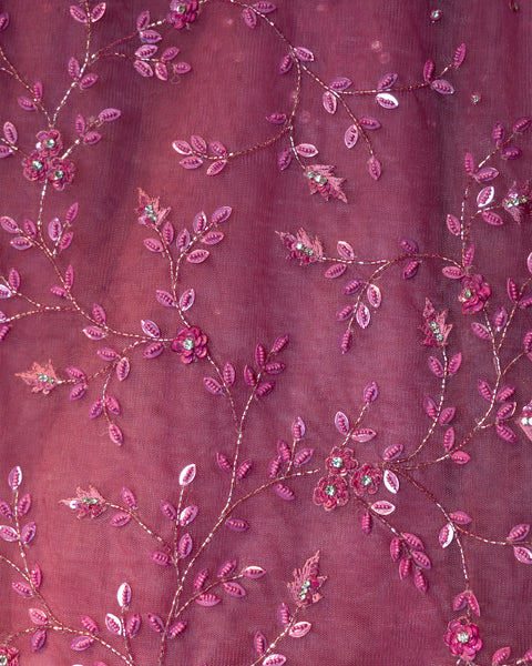 Radiant Pink Net Saree: A Blend of Opulence and Elegance