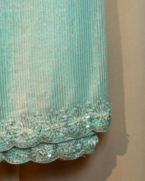 Aqua Green Sequin Saree with Stone Work Border: A Symphony of Elegance