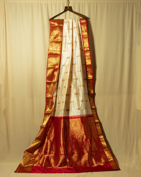 White and red Kanjivaram Saree with intricate zari work