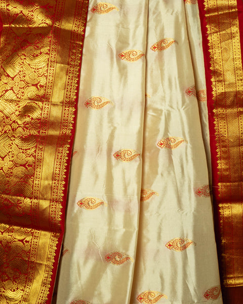 White and red Kanjivaram Saree with intricate zari work