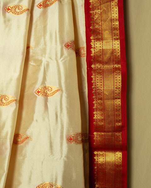 White and red Kanjivaram Saree with intricate zari work